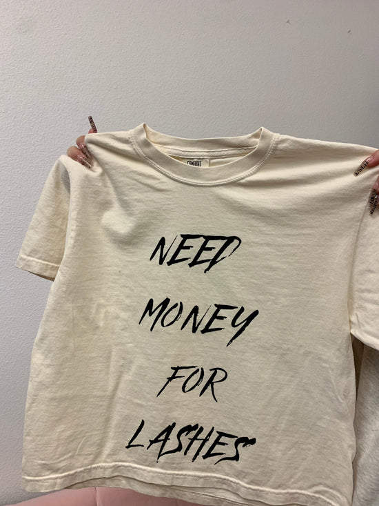 “NEED MONEY FOR LASHES”